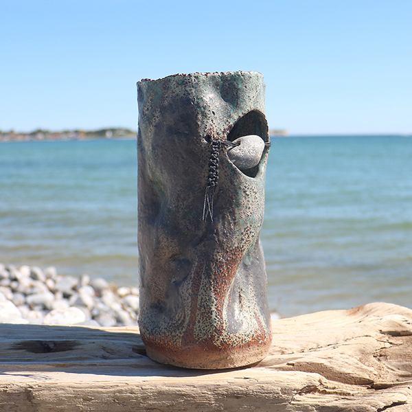 Vase med sten Knyttetsnor 1